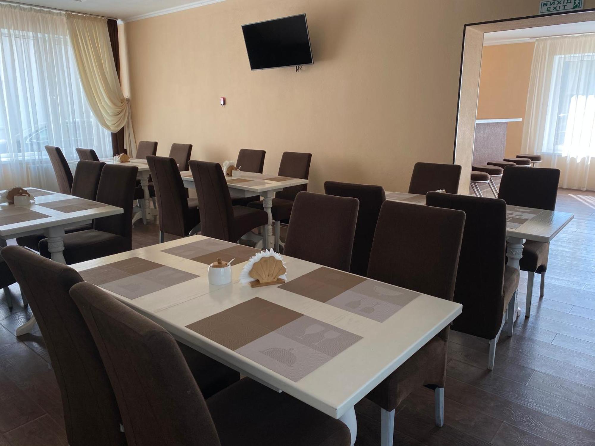 Орхідея Hotel Romny Buitenkant foto