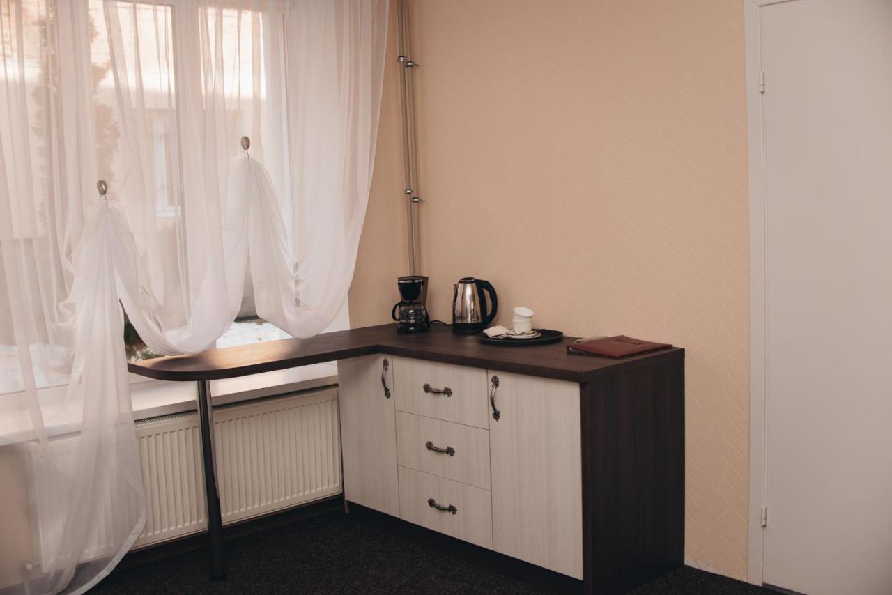 Орхідея Hotel Romny Buitenkant foto