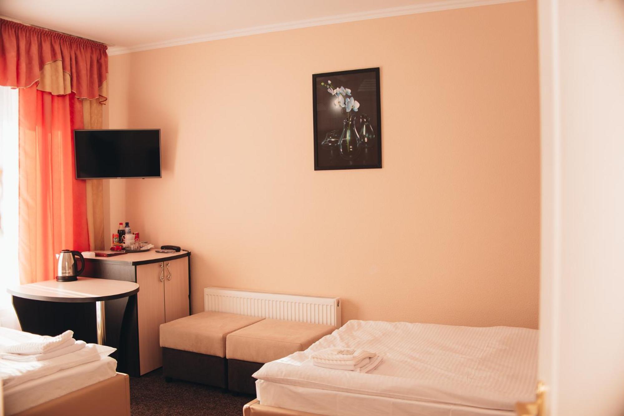 Орхідея Hotel Romny Buitenkant foto